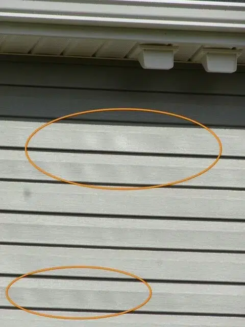 Heat damaged siding on this house in Raleigh NC